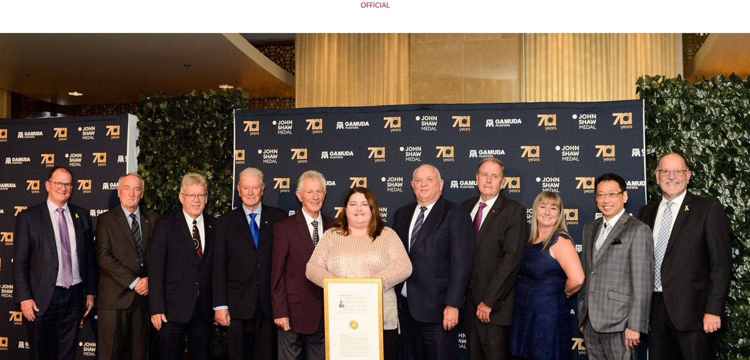 Louise McCormick with John Shaw Medal previous recipients 